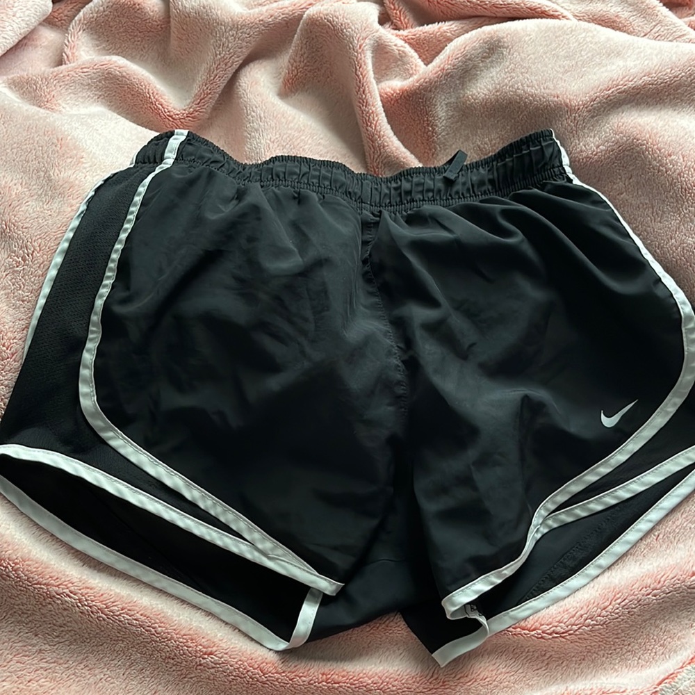 Black Nike running shorts